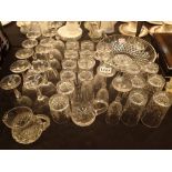 Large collection of crystal drinking glasses and bowls