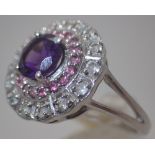 Sterling silver purple stone set fancy halo ring,