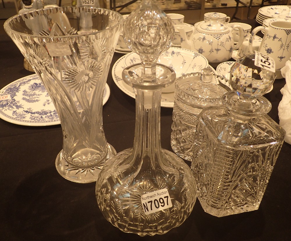 Two cut glass decanters,