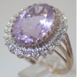 9ct gold dress ring set with twenty four diamonds and a large amethyst, size P,