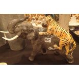 Beswick tiger on elephants back, L: 43 cm CONDITION REPORT: No visible damage,