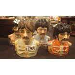 Set of four Beatles Toby jugs, Sgt Pepper,