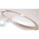 9ct gold diamond set hinged bangle,