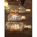 Three ships in bottles including Sussex Studio Glass