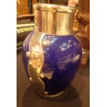 Blue stoneware and metal vase,