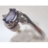 14ct white gold tanzanite and diamond ring,