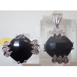 Sterling silver faceted black stone ring and pendant set,