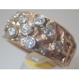 9ct gold gents fancy diamond ring set with ten diamonds, approx 0.