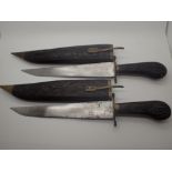 Two Indian wooden sheathed knives