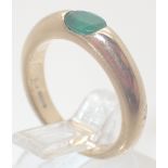 18ct gold oval 0.38ct emerald ring, size K, 5.