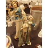 Three fabric Oriental dolls,