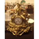 French gilt clock, chiming to a bell CONDITION REPORT: Appears to work,