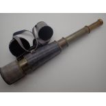 Brass telescope marked Kelvin Hughes in leather case