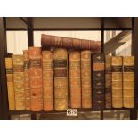 Shelf of antiquarian leather bound books