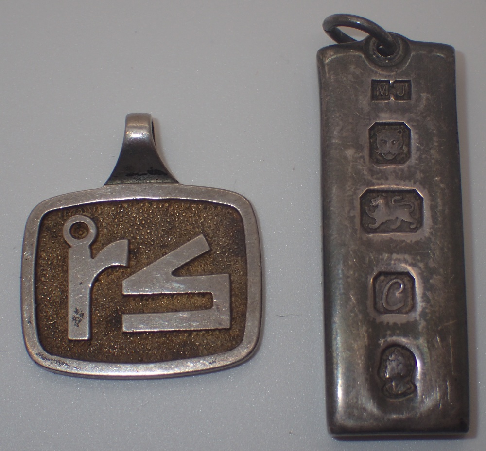 Hallmarked silver ingot pendant and a silver RS key fob