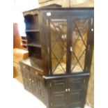 Dark stained oak welsh dresser, two drawers over two cupboards,