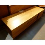 Long low 1970's chesnut sideboard with twin central drawers and matching end cupboards