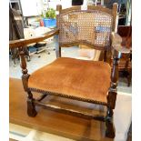Small rattan back upholstered armchair