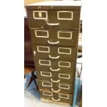 Large metal filing cabinet with seven drawers,