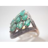 9ct gold fancy emerald and diamond clust