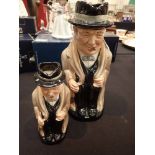 Two Royal Doulton Winston Churchill toby jugs,