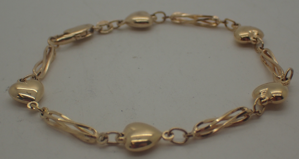 9 ct gold heart twist bracelet, 5.