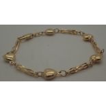 9 ct gold heart twist bracelet, 5.