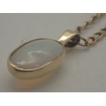 9 ct gold large gold mounted opal on a 9 ct gold chain, total weight 11.0 g, chain weight 6.