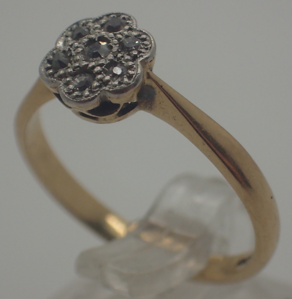 18 ct gold diamond flower head ring, size M/N, 2.