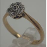 18 ct gold diamond flower head ring, size M/N, 2.