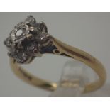 18 ct gold diamond flower head ring, size M, 3.