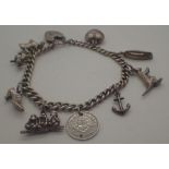 Sterling silver charm bracelet with nine charms