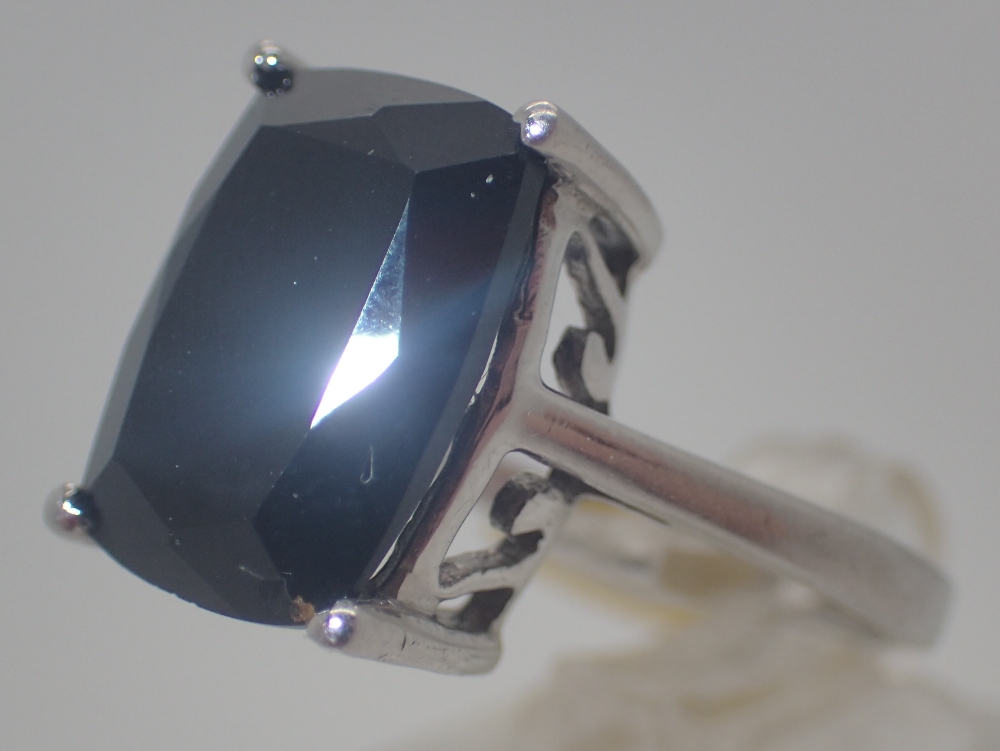 Sterling silver faceted black stone solitaire ring,