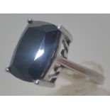 Sterling silver faceted black stone solitaire ring,