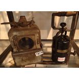 Two vintage handheld railway lanterns