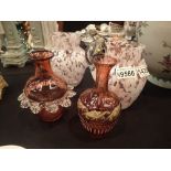 Two pieces of Cranberry glass and two pink and white glass jugs