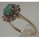 Yellow gold, green stone and diamond ring,