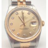 Boxed Rolex Oyster Perpetual date with silver champagne diamond dial and bi-coloured metal strap,