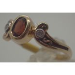 14 ct gold fancy garnet and diamond ring,