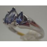 New old stock 9 ct white gold marquise cut tanzanite three stone set ring, with certificate,