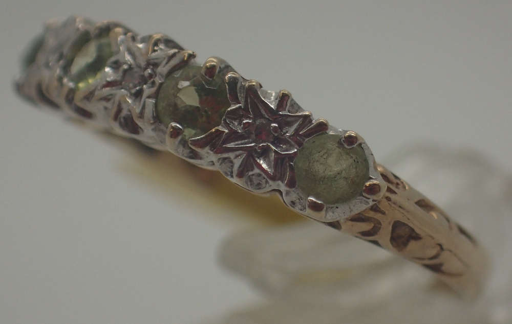 9 ct gold peridot and diamond half eternity ring,