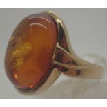 9 ct gold cabochon amber ring,
