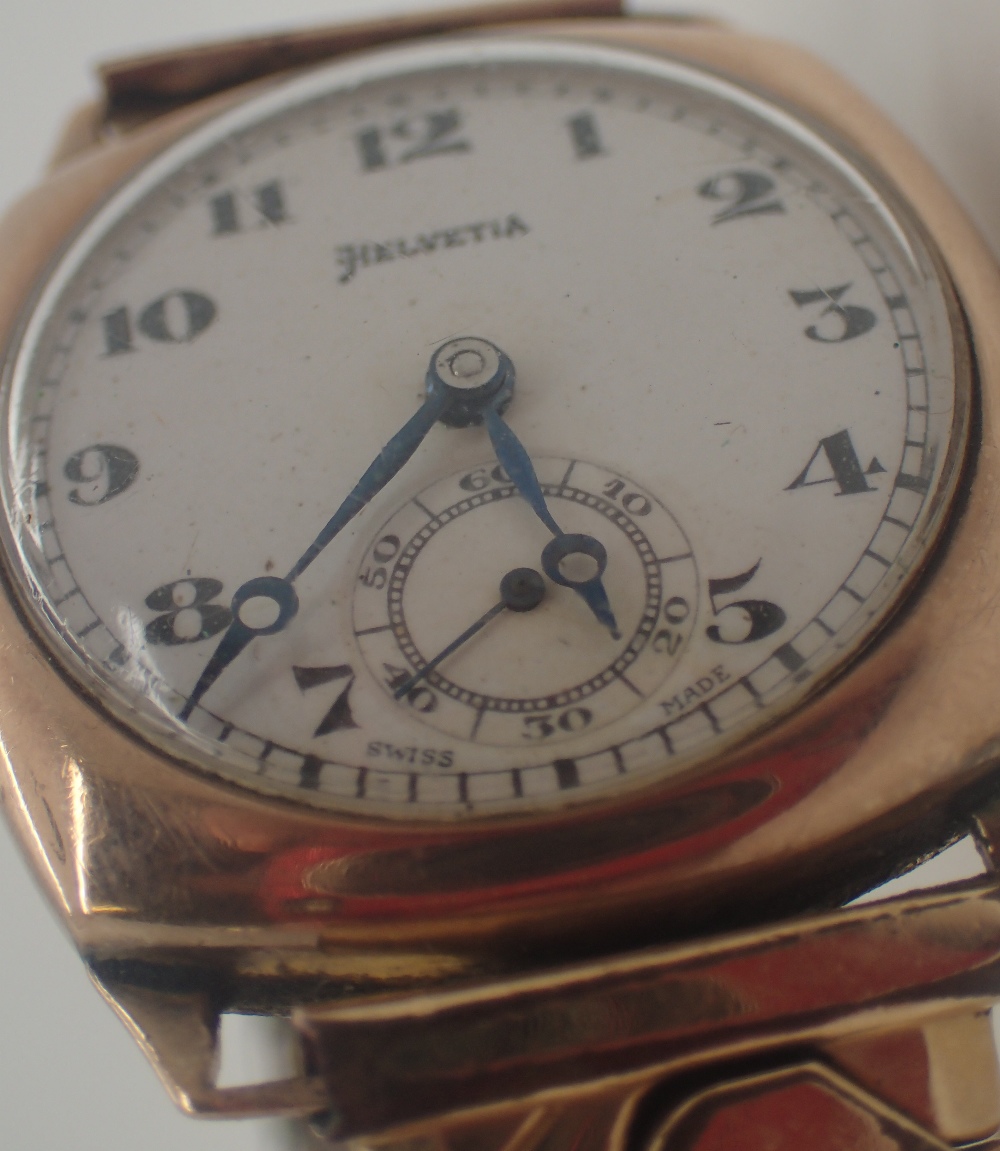 Helvetia 9 ct gold wristwatch on a plated expanding bracelet