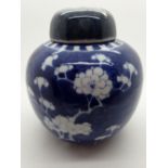 Blue and white antique Oriental prunus pattern ginger jar with original cork,