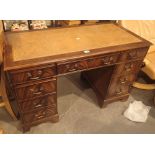 Flame walnut twin pedestal desk with leather inlaid top, three top drawers,