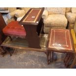Nest of three red leather top tables matching magazine rack,