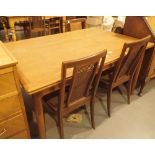 G Plan drawleaf table and a set of G Plan teak rattan back dining chairs,