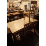 Large stripped pine farmhouse dining table with four pine dining chairs,