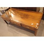 Low coffee table with brass fittings,