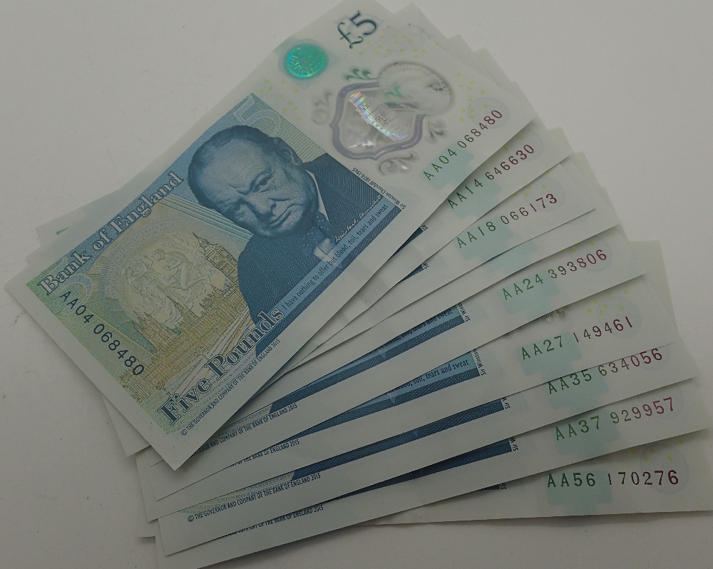 Nine AA £5 notes, AA04, AA14, AA18, AA23